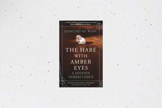 The Hare with Amber Eyes by Edmund de Waal, a memoir tracing a family’s history through a collection of Japanese netsuke.