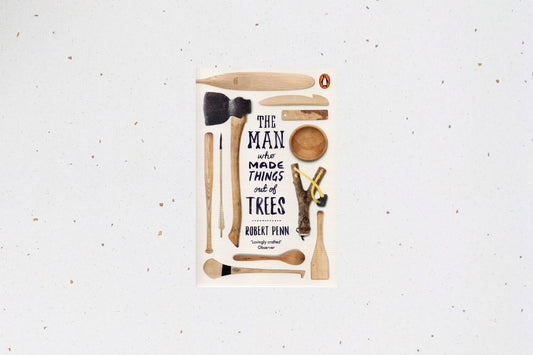 The Man Who Made Things Out of Trees by Robert Penn, exploring the many uses of ash wood through craft and history.